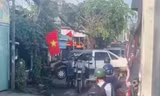 Xe ba gác 'cõng' ô tô, tài xế lĩnh phạt 10 triệu đồng