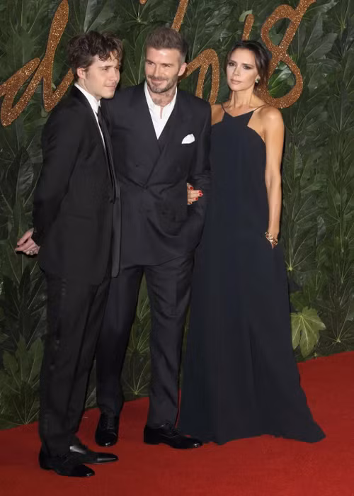Vợ chồng Beckham thất vọng khi con trai quên mất gốc gác. Ảnh: Getty Images.
