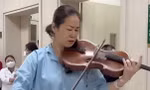 Hàng triệu người xem nữ bệnh nhân chơi đàn ở Bệnh viện Bạch Mai