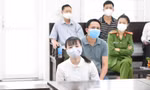 Các bị cáo Thủy, Nam tại tòa.