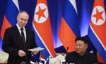 Tổng thống Nga Vladimir Putin và Chủ tịch Triều Tiên Kim Jong Un tại tiệc chiêu đãi ở Bình Nhưỡng ngày 19/6. (Ảnh: Sputnik)