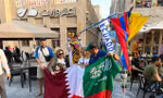 Cổ động viên các nước đổ bộ đến Qatar. Ảnh: Kim Dung