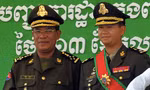 Thủ tướng Campuchia Hun Sen (trái) và con trai cả Hun Manet