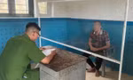 Nguyễn Thành Minh tại cơ quan công an. Ảnh: CACC