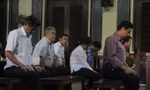 Các bị cáo tại phiên tòa ngày 21/8. Ảnh: Tân Châu.