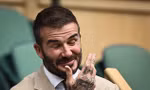 Hình ảnh David Beckham gà gật trên khán đài gây chú ý