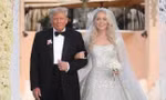 Ông Trump hôn má con gái út trong ngày trọng đại