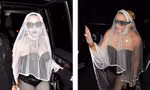 Diện bodysuit da đen và mạng che mặt, dân mạng cầu xin Madonna sống đúng tuổi