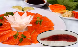 Ăn gỏi cá nguy cơ nhiễm sán lá gan nhỏ và sán lá gan nhỏ Clonorchis sinensis. Ảnh nhỏ: Nguyễn Tâm