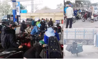 Người dân xếp hàng dài, mang thêm bình nhựa mua xăng trước giờ tăng giá
