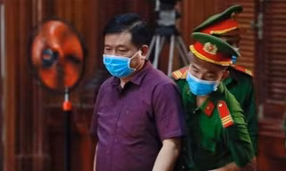 Ông Đinh La Thăng tại phiên tòa sơ thẩm. Ảnh: Tân Châu