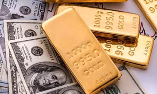 Giá vàng giảm, USD “hạ nhiệt”. Ảnh minh hoạ 