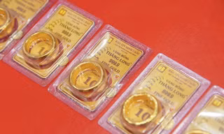Giá vàng nhẫn giảm, USD hạ nhiệt