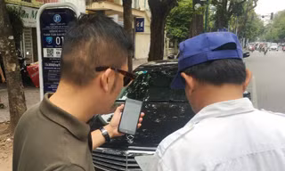 Chấp nhận thanh toán bằng cả tin nhắn và tiền mặt để mở lỗi thoát cho đỗ xe iParking