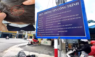 Nhiều người đi đường bị chảy máu đầu vì bảng thông tin công trình trên vỉa hè 