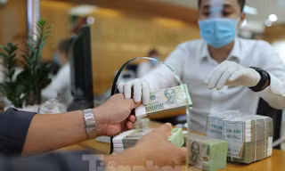 NHNN đang lấy ý kiến dự thảo Thông tư 01, gia hạn thời gian cơ cấu thời hạn trả nợ thêm 6 tháng, tức đến hết tháng 6/2022 (Ảnh: Như Ý)