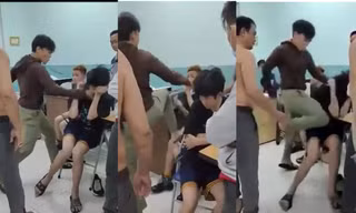 Hình anh hai thiếu niên bị đánh ở Trường THCS Nguyễn Văn Tố, quận 10 làn truyền trên mạng xã hội