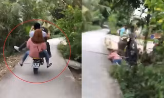 Nam thanh niên chở theo cô gái bốc đầu xe máy ngã xuống đường