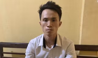 Hưng tại cơ quan điều tra. Ảnh: Minh Trang.