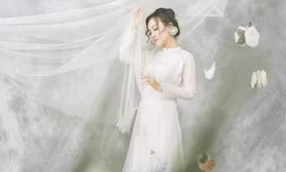 BTV Hoài Anh mơ màng như công chúa với áo dài cách tân