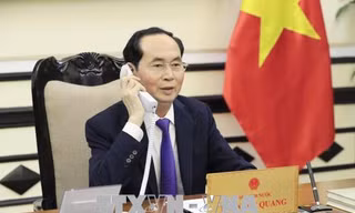 Chủ tịch nước Trần Đại Quang điện đàm với Tổng thống Putin. (Ảnh: TTXVN)