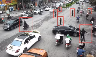 Triệu tập nhóm người mặc đồng phục 'điều tiết giao thông' cho đoàn xe cưới