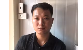 Quý tại cơ quan công an.