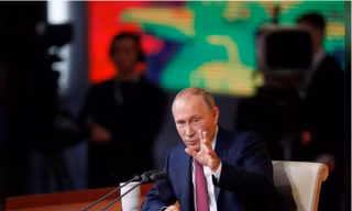 Tổng thống Nga Putin trả lời các câu hỏi trong cuộc họp báo hôm 14/12. Ảnh: Reuters