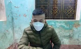 Đối tượng Vũ Hoàng Nghĩa tại cơ quan công an -Ảnh: H. Thơ