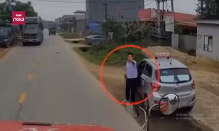 Tài xế taxi chặn đầu, rút ống tuýp đòi 'ăn thua' với tài xế container