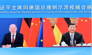 Chủ tịch Trung Quốc Tập Cận Bình và Thủ tướng Đức Olaf Scholz có cuộc hội đàm trực tuyến ngày 9/5. (Ảnh: Xinhua)