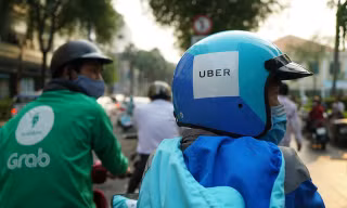Vụ Grab mua lại Uber có thể ảnh hưởng cạnh tranh quốc gia