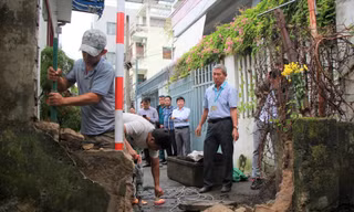 Người dân đi lại thuận tiện hơn khi bức tường án ngữ 50 năm bị xóa sổ. Ảnh: Thanh Trần