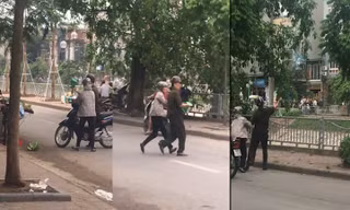 Trật tự phường ném cân của người bán hàng rong xuống sông. Ảnh: Cắt từ clip