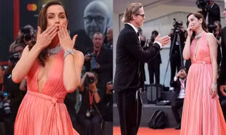 Bond Girl gốc Cuba mặc mốt không nội y, cười đùa với Brad Pitt trên thảm đỏ LHP Venice