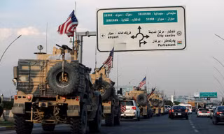 Nhóm quân Mỹ rút khỏi miền Bắc Syria. Ảnh: Reuters