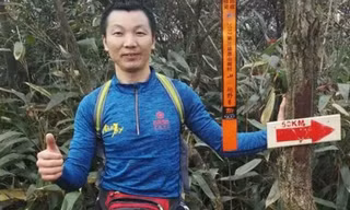 Pan Shancu dừng ven đường chụp ảnh khi đang chạy bộ về quê ăn Tết. Ảnh: SCMP