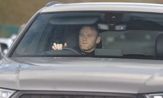 Wayne Rooney xuất hiện tại sân tập của Everton vào ngày 31/8.