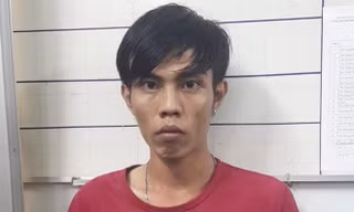 Lộc tại cơ quan điều tra. Ảnh: Minh Anh.