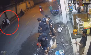 L. ra tay đánh vợ ngay trên đường.