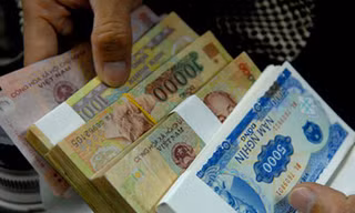 Sôi động dịch vụ đổi tiền lẻ ngày Tết