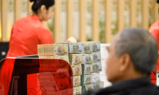 Vốn rẻ đang đổ vào các ngân hàng thương mại