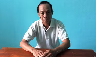 Nghi phạm Nguyễn Quốc Long tại cơ quan công an