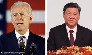 Tổng thống Mỹ Joe Bidne (trái) và Chủ tịch Trung Quốc Tập Cận Bình. (Ảnh: AP)