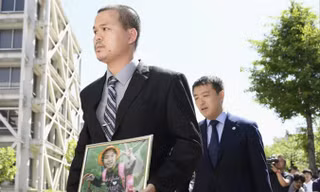 Anh Lê Anh Hào, bố nạn nhân. Ảnh: Japan Times.