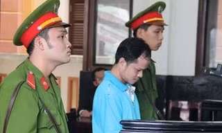 Võ Văn Minh nghe tòa tuyên án ngày 18/12/2015. Ảnh: Tân Châu