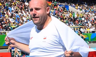 VĐV Piotr Malachowski.