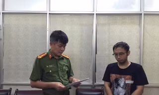 Ông Lê Thái Sơn khi bị tạm giữ.
