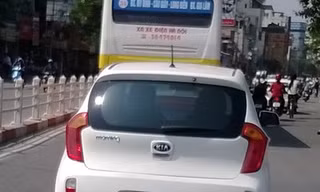 Kia Morning gắn biển ngũ quý 9