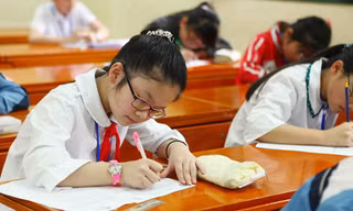 Dưới 1% học sinh trên toàn quốc sẽ phải thi vào lớp 6. Ảnh: H.H.